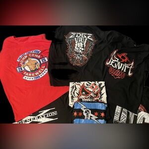 Lot of 8 WWE Graphic T-Shirts Collection
XL 
Never worn